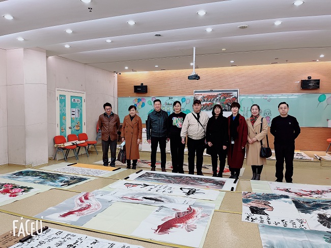 民建唐山市委路北区工委二支部会员参加“翰墨飘香，与爱同行”公益助学书画交流会1-1.jpg