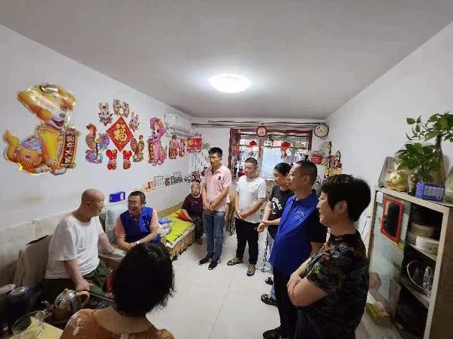 民建唐山市委路北区工委八支部组织参观红色记忆展示馆、慰问抗美援朝参战老兵活动.jpg