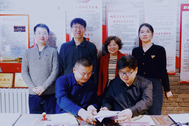 民建秦皇岛市委北戴河总支一支部与民建濮阳市委油田总支一支部缔结友好支部 (2).jpg