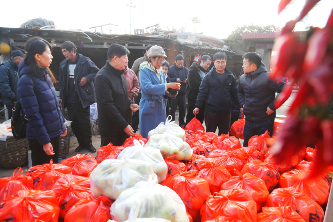 民建唐山市委路南区工委扶贫助残爱心行动 (3) (2).jpg